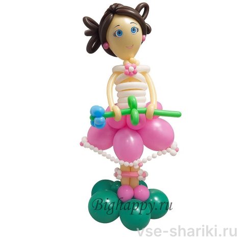 Фигура барышни в розовой юбке с рюшами и цветком