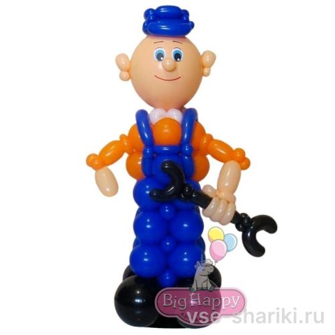 Фигура мастера в синем комбинезоне с гаечным ключом